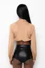 NEVER BE LIKE YOU TWIST FRONT CROP LONG SLEEVE TOP sold by AKIRA