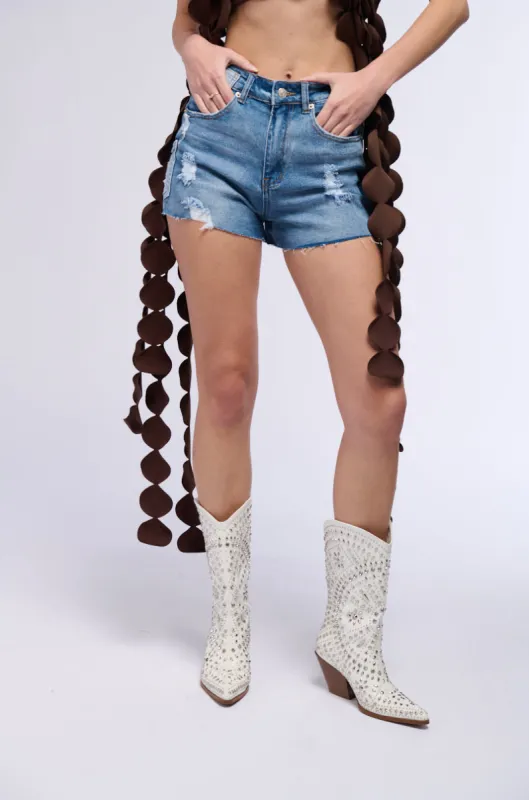 ANGELIE DISTRESSED DENIM CUT OFF SHORT sold by AKIRA