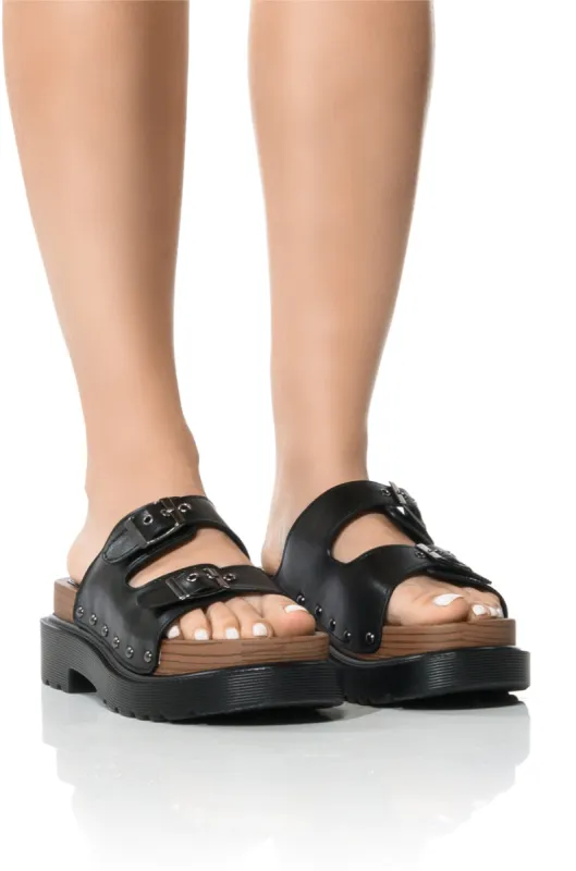 SLOW MOTION FLAT SANDAL IN BLACK sold by AKIRA