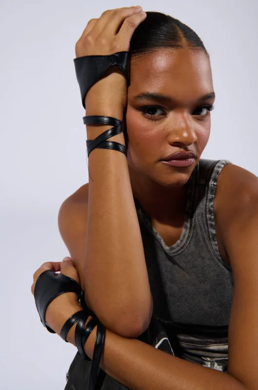 WRAPPED AROUND PU FINGERLESS GLOVES sold by AKIRA