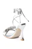 AZALEA WANG APATE EMBELLISHED BOW SANDAL IN SILVER sold by AKIRA