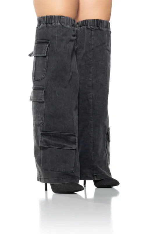 SCANDALOUS BLACK FOLD OVER BOOT sold by AKIRA