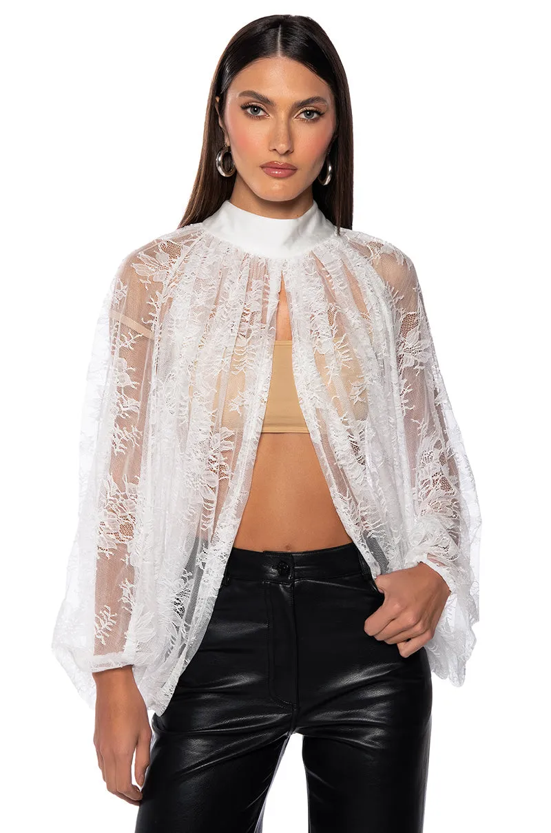 CHEYENNE EXPOSED BACK FLORAL BLOUSE sold by AKIRA