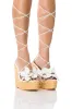 BLOOMY FLOWER LACE UP WEDGE SANDAL IN WHITE sold by AKIRA