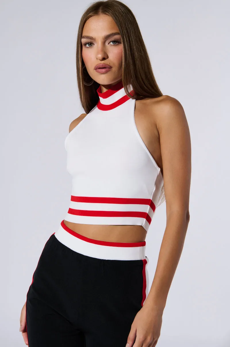 RAYE CROPPED HALTER TOP sold by AKIRA