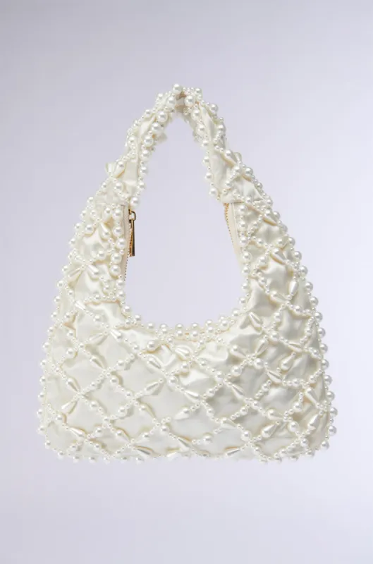 OLD MONEY PEARL EMBELLISHED PURSE sold by AKIRA