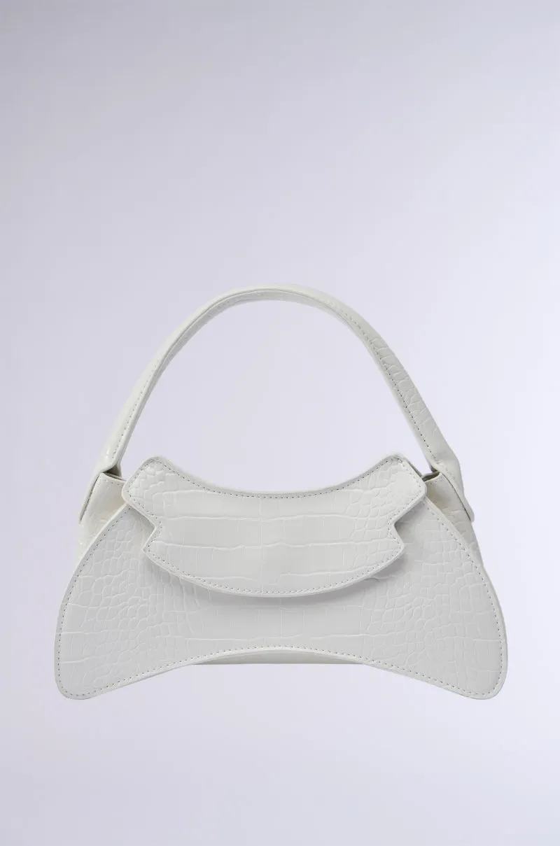 CATWALK STATUS PURSE sold by AKIRA