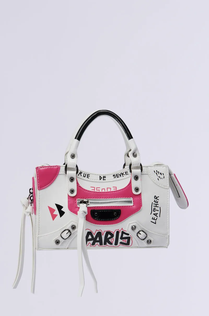 PARIS LOVES ME GRAFFITI PURSE sold by AKIRA