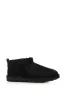 UGG ULTRA MINI BOOTIE IN BLACK sold by AKIRA