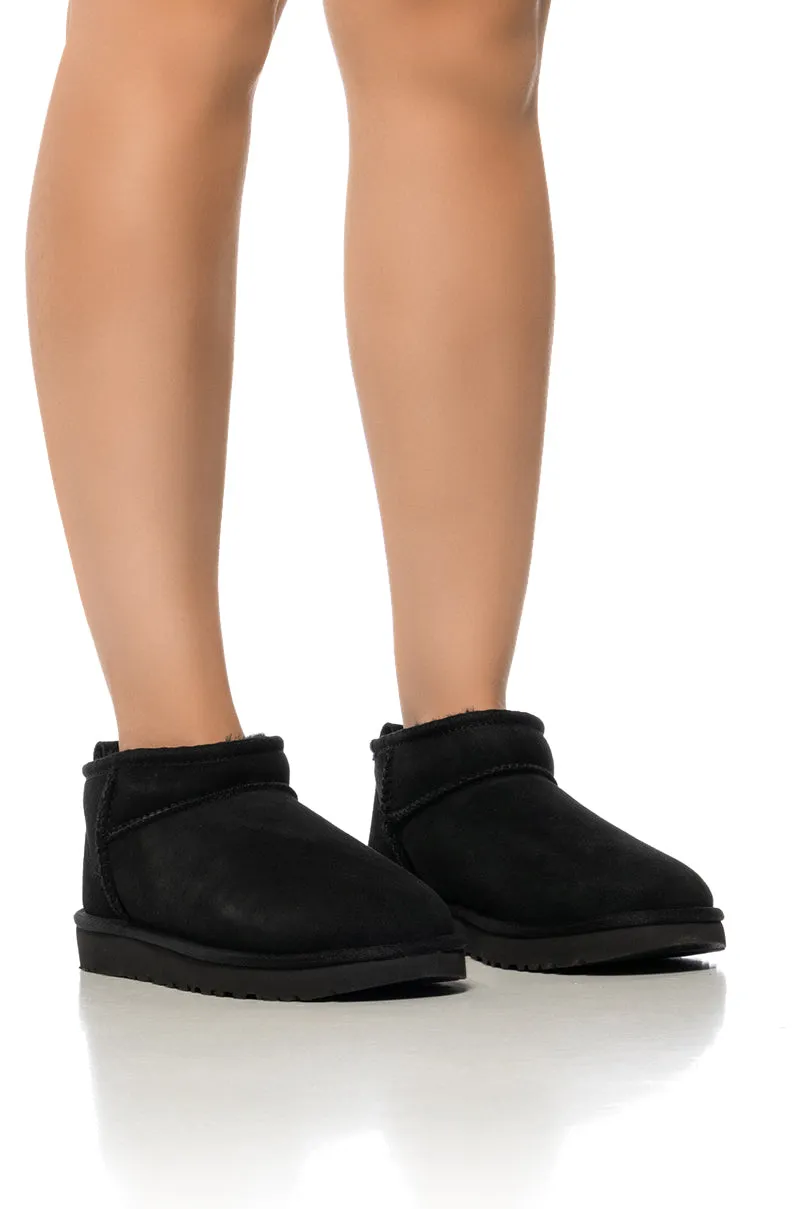 UGG ULTRA MINI BOOTIE IN BLACK sold by AKIRA