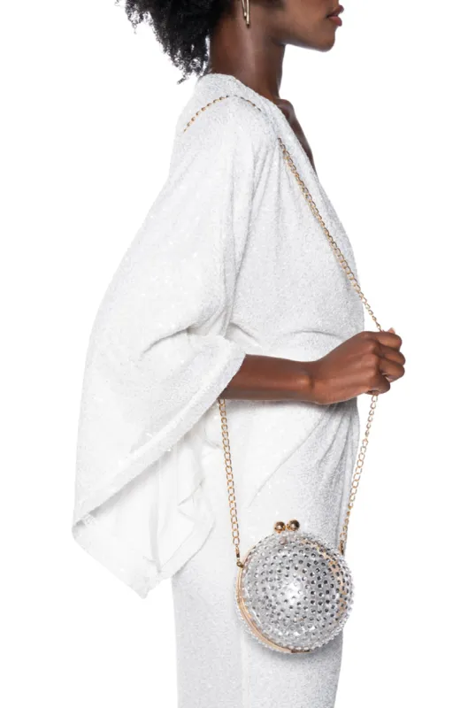 SUPERNOVA EMBELLISHED CLUTCH sold by AKIRA