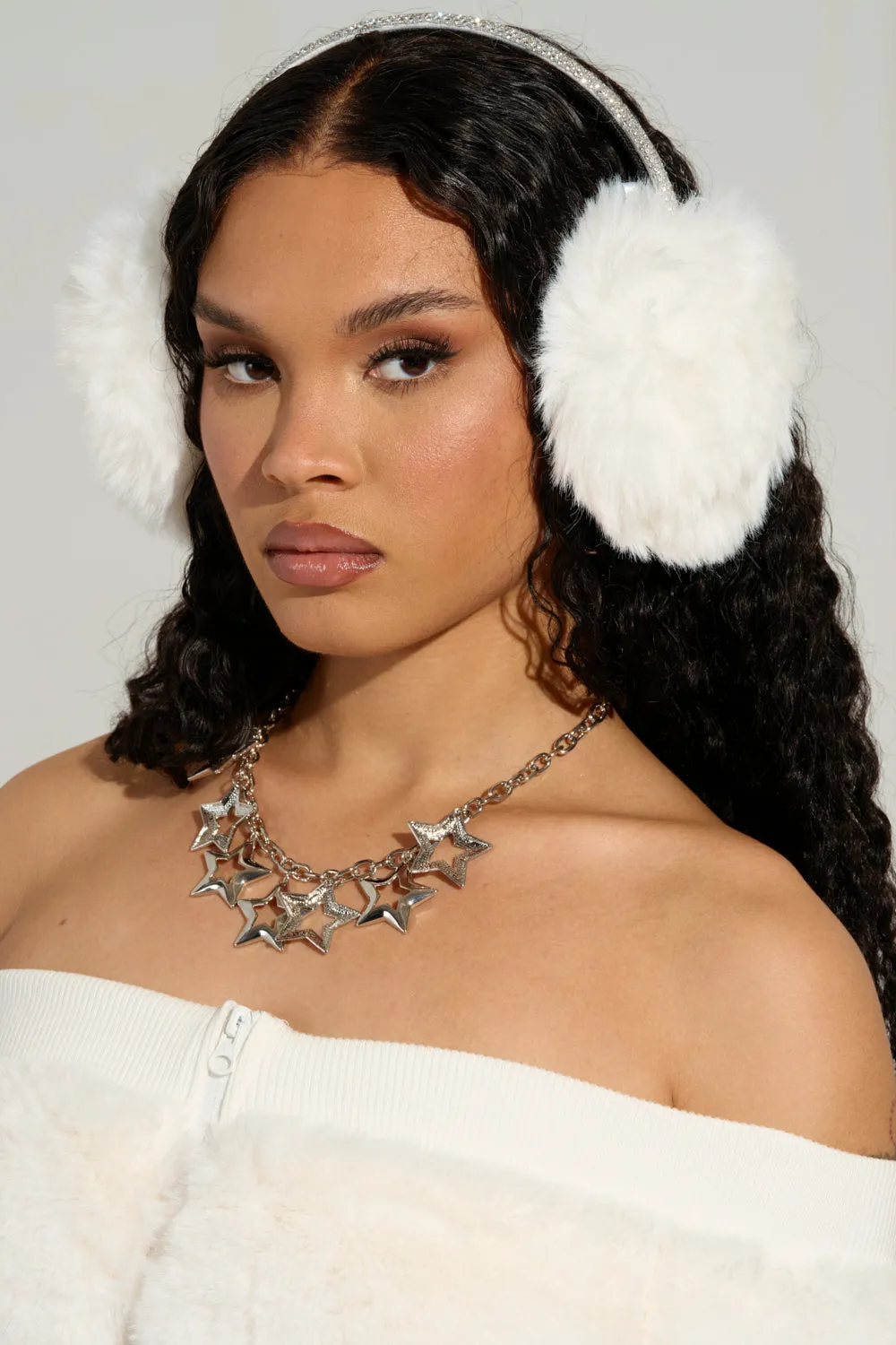 EXTRA RHINESTONE EAR MUFFS IN WHITE sold by AKIRA