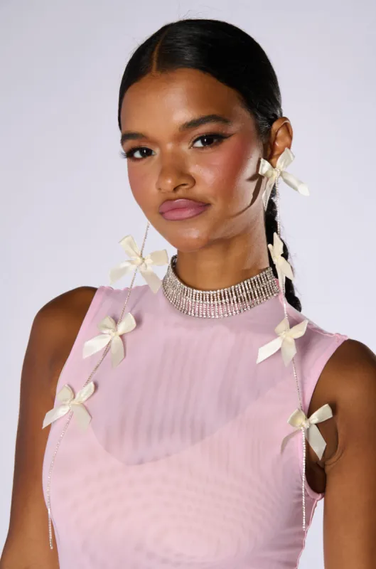 COQUETTE DREAMING EARRINGS sold by AKIRA