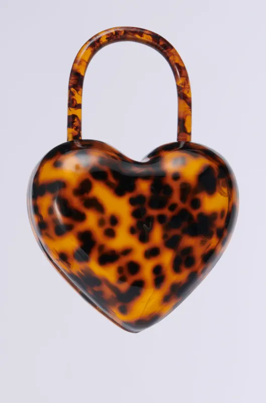 HEART ON LOCK PURSE sold by AKIRA
