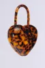 HEART ON LOCK PURSE sold by AKIRA