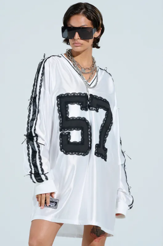 PUT A BOW ON IT JERSEY DRESS sold by AKIRA