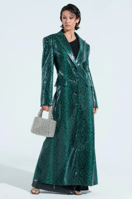 INCOGNITO SNAKE PRINT TRENCH IN GREEN sold by AKIRA