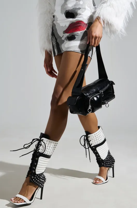 AZALEA WANG ALBERTO WHITE AND BLACK GLADIATOR SPORTY BOOT sold by AKIRA