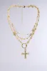 PRAYING FOR SPRING LAYERED NECKLACE sold by AKIRA