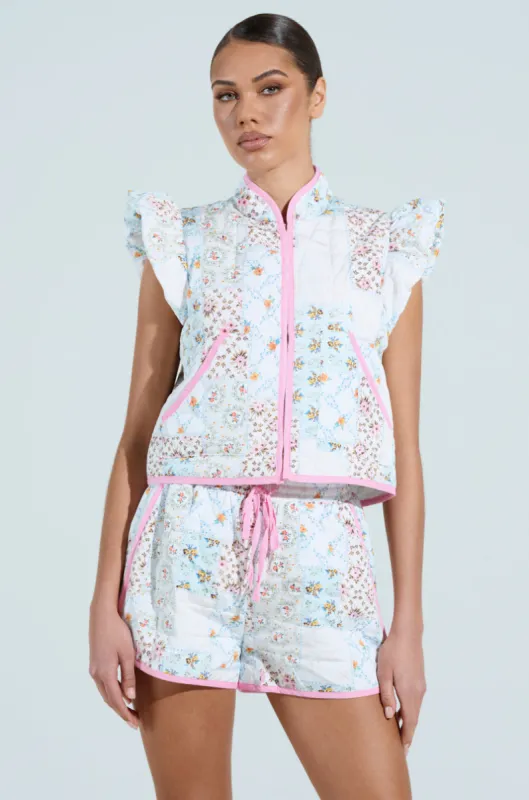 MIXED FLORAL PUFFER VEST sold by AKIRA