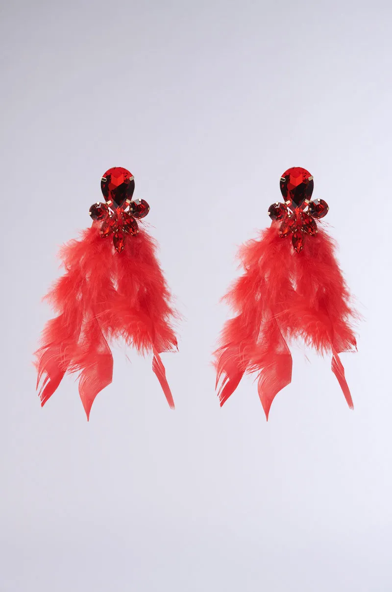 SEE RED FEATHER EARRING sold by AKIRA