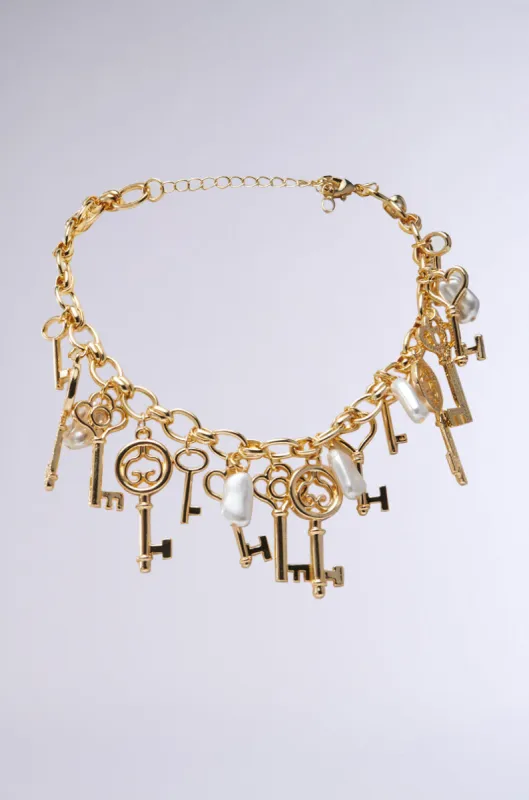 YOU HAVE THE KEY CHARM NECKLACE sold by AKIRA