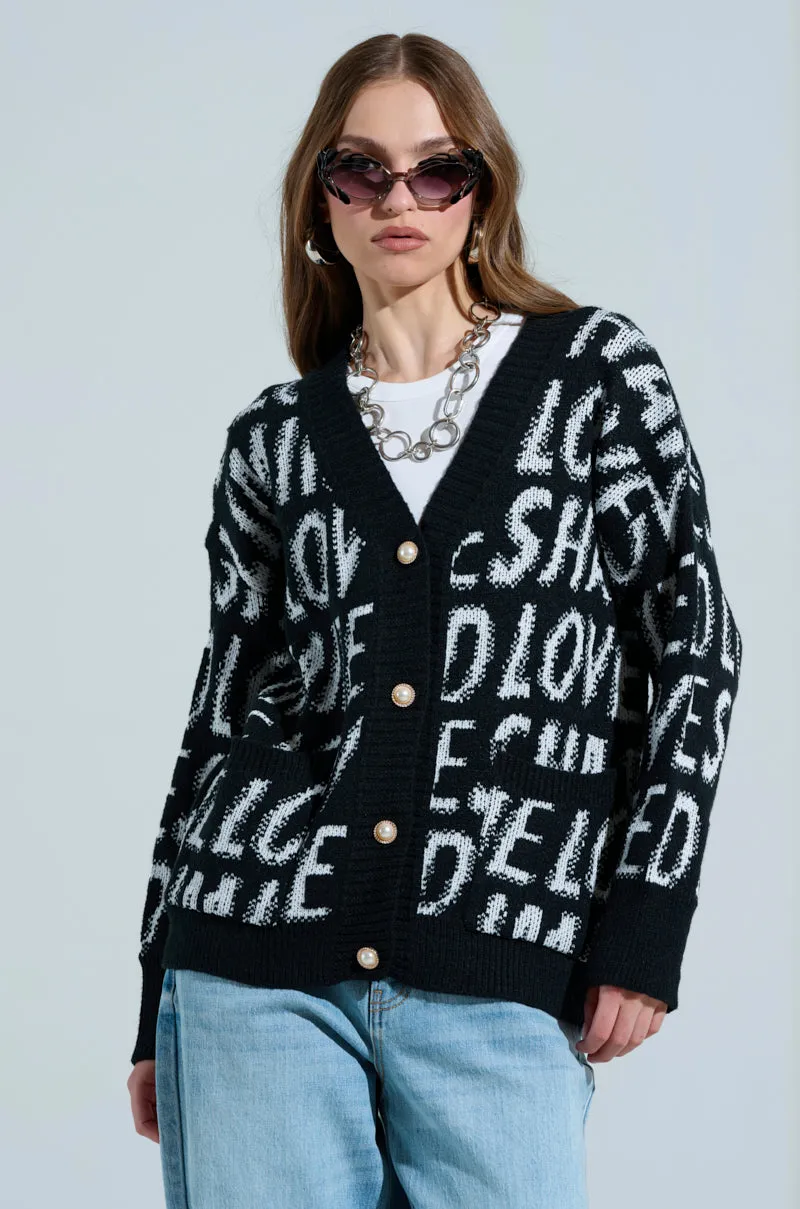 I JUST FEEL LIKE GRAPHIC CARDIGAN sold by AKIRA