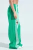 JUMP AROUND WIDE LEG JOGGER IN GREEN sold by AKIRA