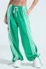 JUMP AROUND WIDE LEG JOGGER IN GREEN sold by AKIRA