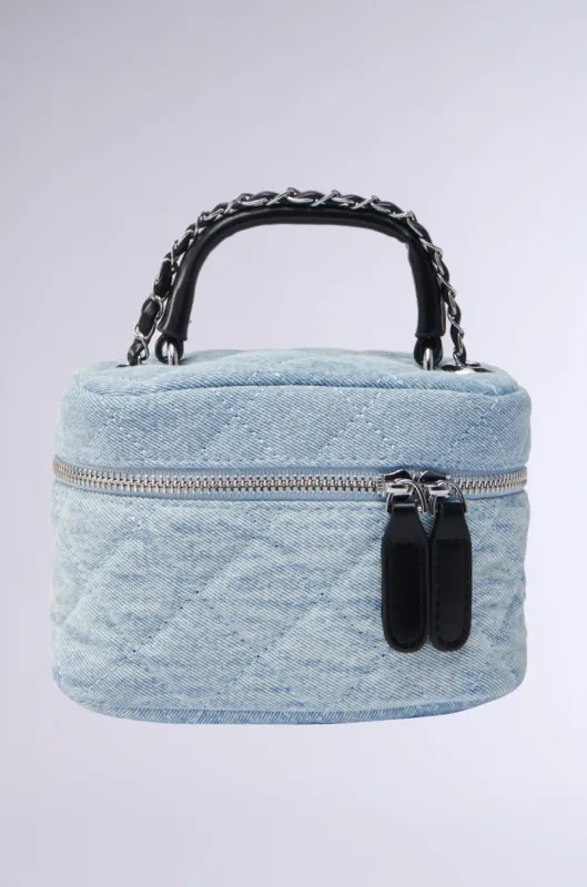 CHACHA DENIM MINI PURSE sold by AKIRA