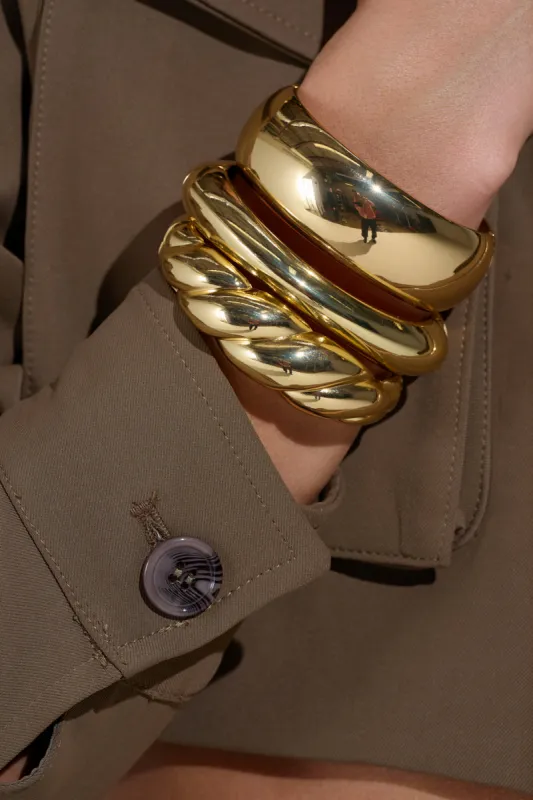 BITE ME GOLD BRACELET SET sold by AKIRA