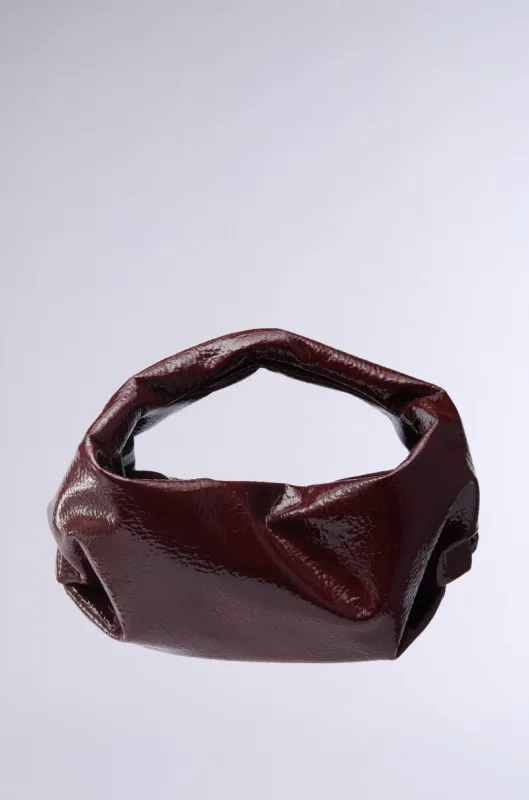 LEATHER LOVIN' PU PURSE IN BURGUNDY sold by AKIRA