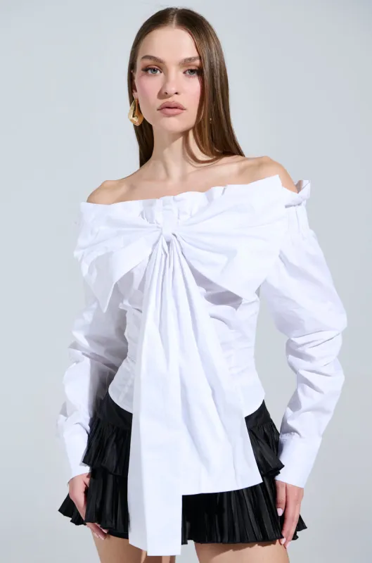 BOWED UP BLOUSE sold by AKIRA