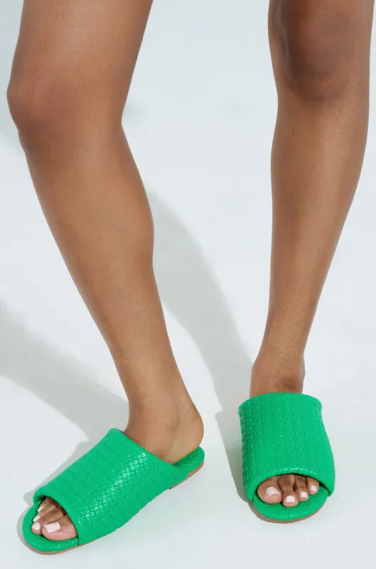 AKIRA GAIA GREEN BRAIDED FLAT SLIP ON SANDAL sold by AKIRA