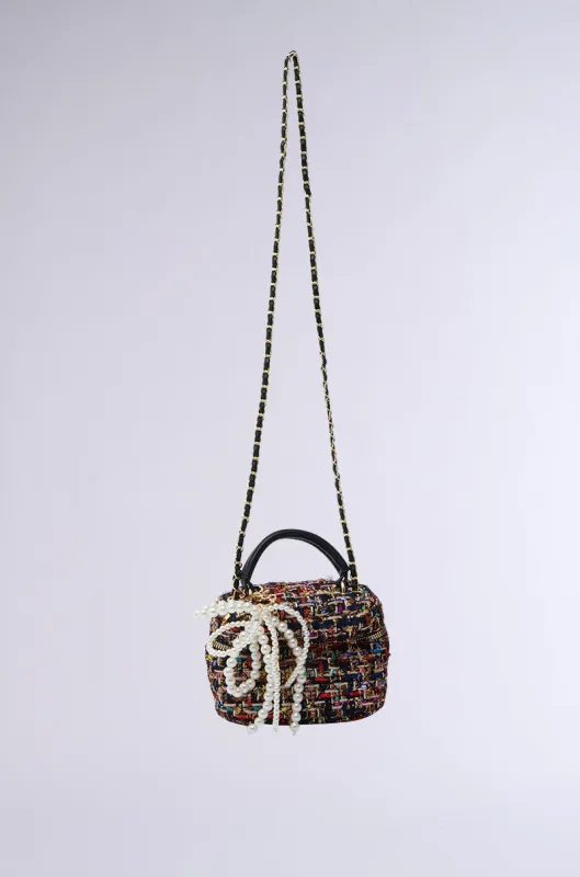IN THE CITY MINI JUNK BAG sold by AKIRA