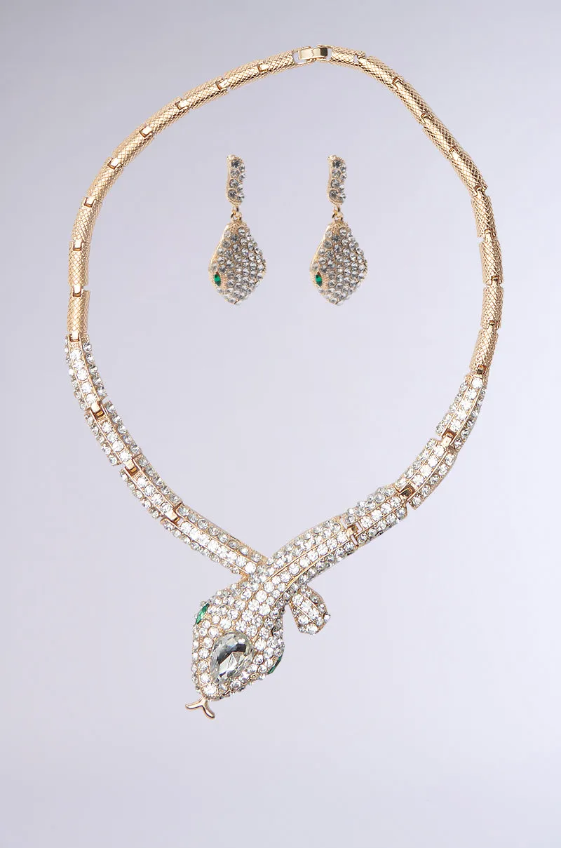 BITE ME LUXE SNAKE NECKLACE AND EARRINGS SET sold by AKIRA