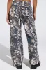 ON TOP OF IT WASHED CAMO JOGGER sold by AKIRA
