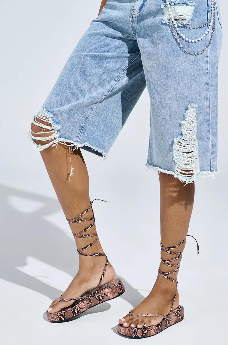 AKIRA IRVINE BROWN SNAKE LACE UP FLAT SANDAL sold by AKIRA