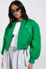 LUCKY ME ASYMMETRICAL BOMBER IN GREEN sold by AKIRA