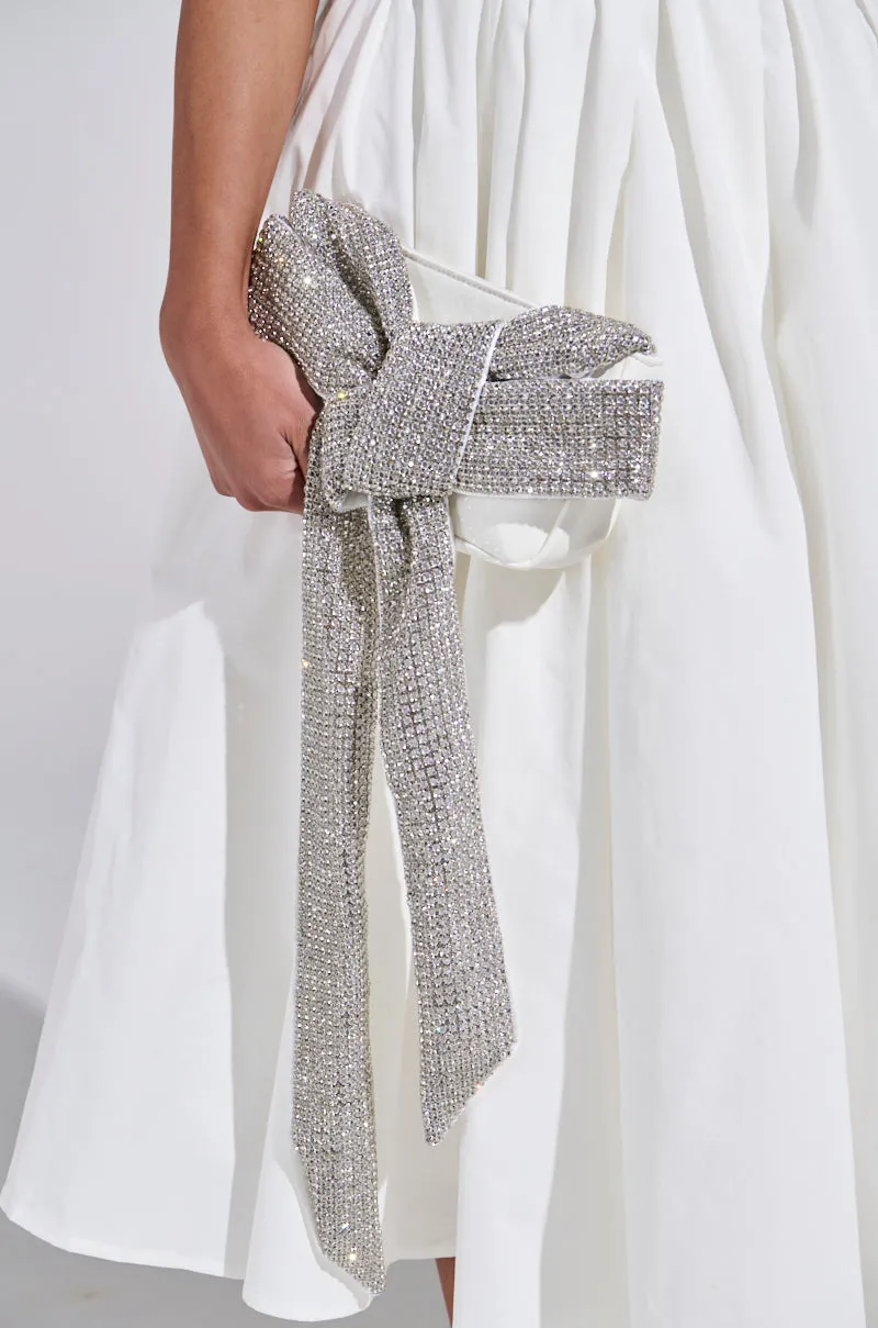 TIE IT UP RHINESTONE CLUTCH sold by AKIRA