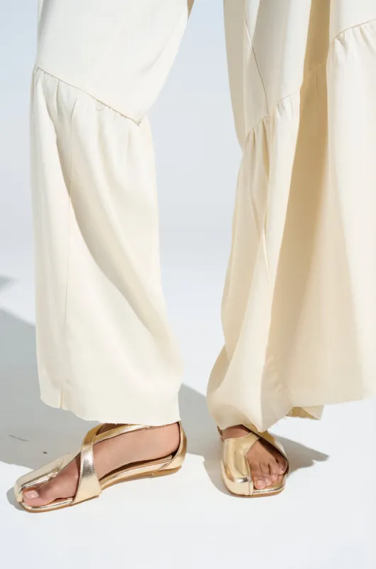 AKIRA AULORA GOLD FLAT SANDAL WITH PEEP TOE sold by AKIRA