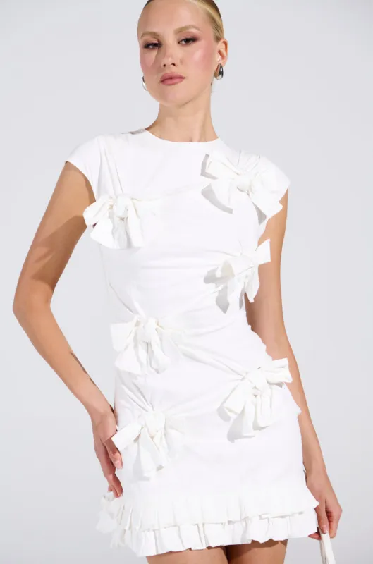 PUT A BOW ON IT LINEN MINI DRESS sold by AKIRA