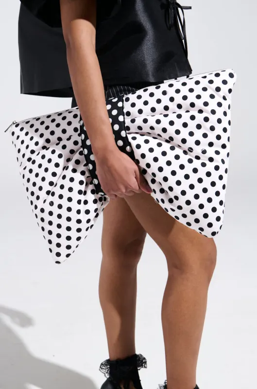 GET WITH IT BOW CLUTCH sold by AKIRA