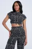 SET YOU FREE CROP WOVEN BLACK MULTI TOP sold by AKIRA