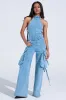 DON'T YOU DARE DENIM JUMPSUIT IN BLUE sold by AKIRA