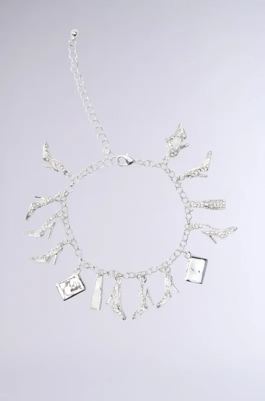 STILETTO CHARM BRACELET sold by AKIRA