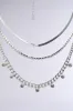 LAYERED UP SILVER NECKLACE sold by AKIRA