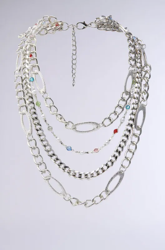 TAKE A NOTE SILVER NECKLACE sold by AKIRA
