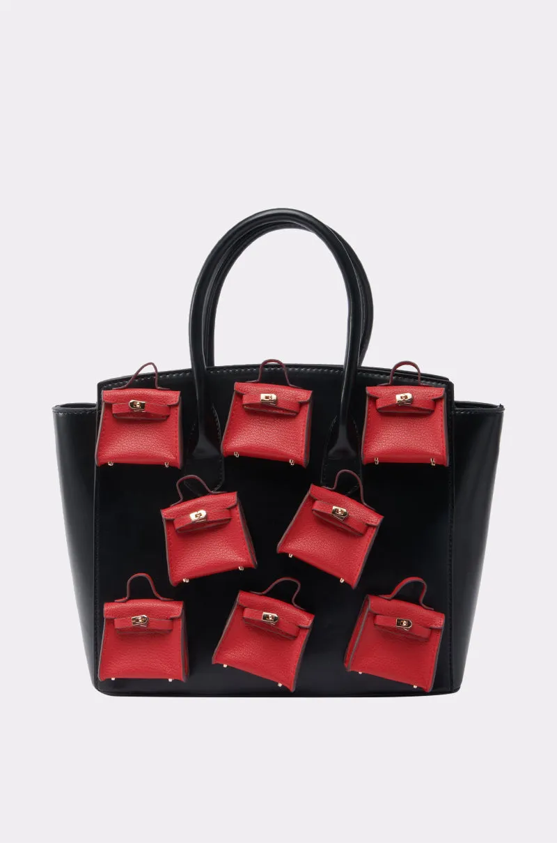 STAY IN MY BAG PURSE sold by AKIRA