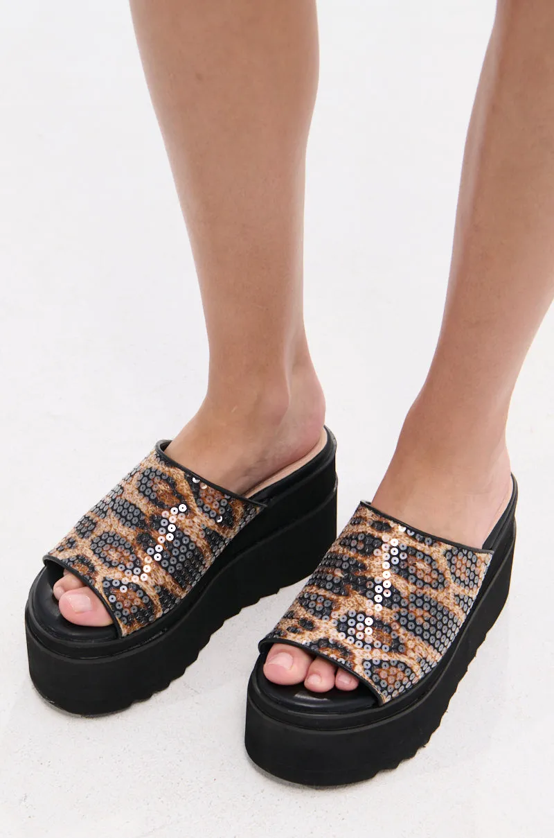 AZALEA WANG CORLISS LEOPARD FLATFORM SANDAL sold by AKIRA